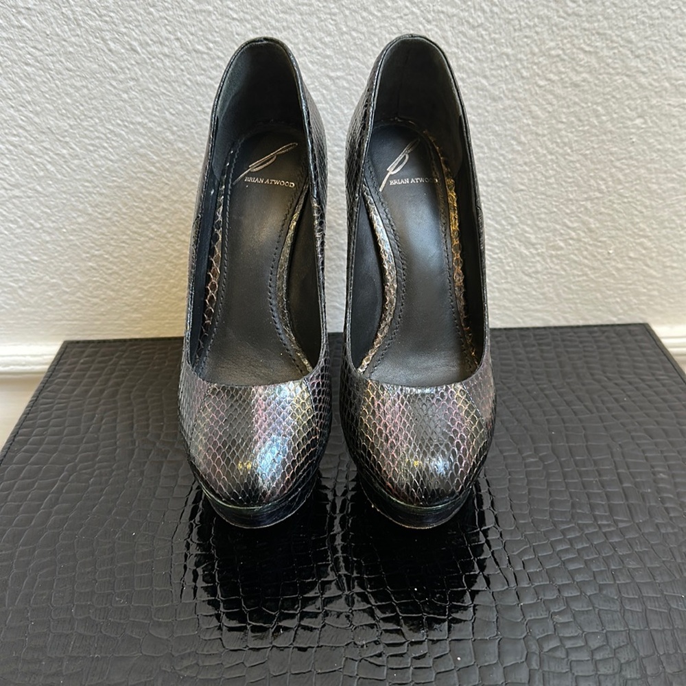 Gorgeous Brian Atwood iridescent snake skin pumps.